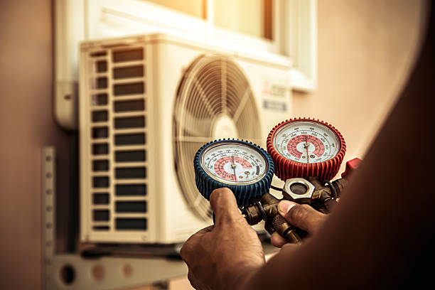Professional Heat Pump Repair technician working in Wappingers Falls, NY